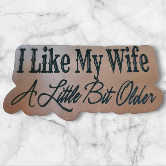 I Like My Wife a Little Bit Older Patch – Funny Brown Leatherette Iron-On Hat Patch