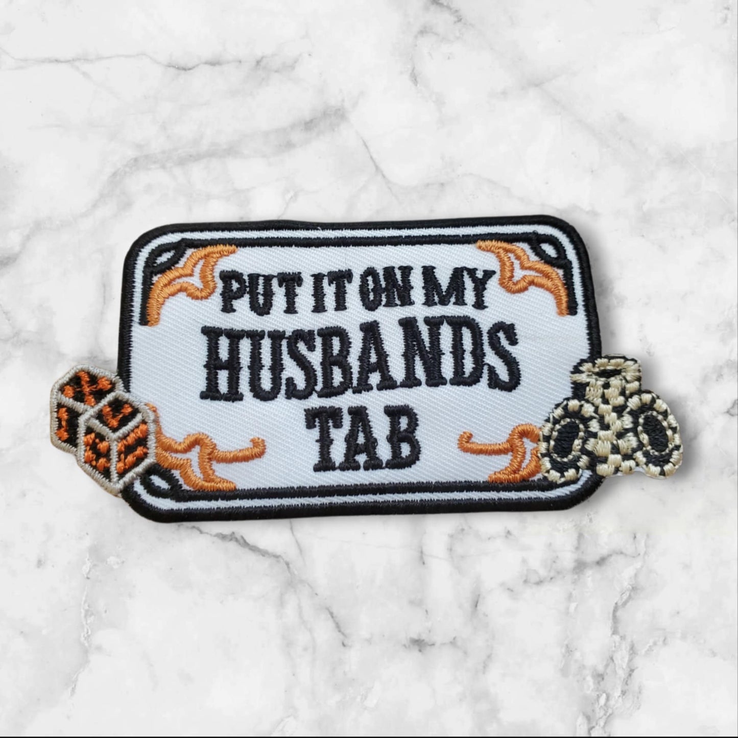Casino Wife Patch - "Put It On My Husband's Tab" with Dice & Poker Chips Embroidered Appliqué