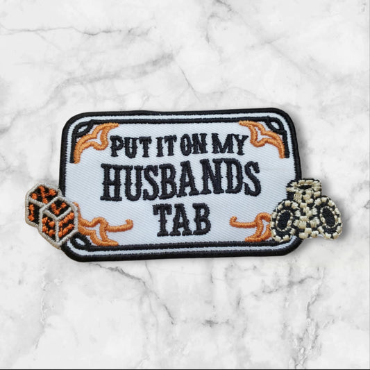 Casino Wife Patch - "Put It On My Husband's Tab" with Dice & Poker Chips Embroidered Appliqué
