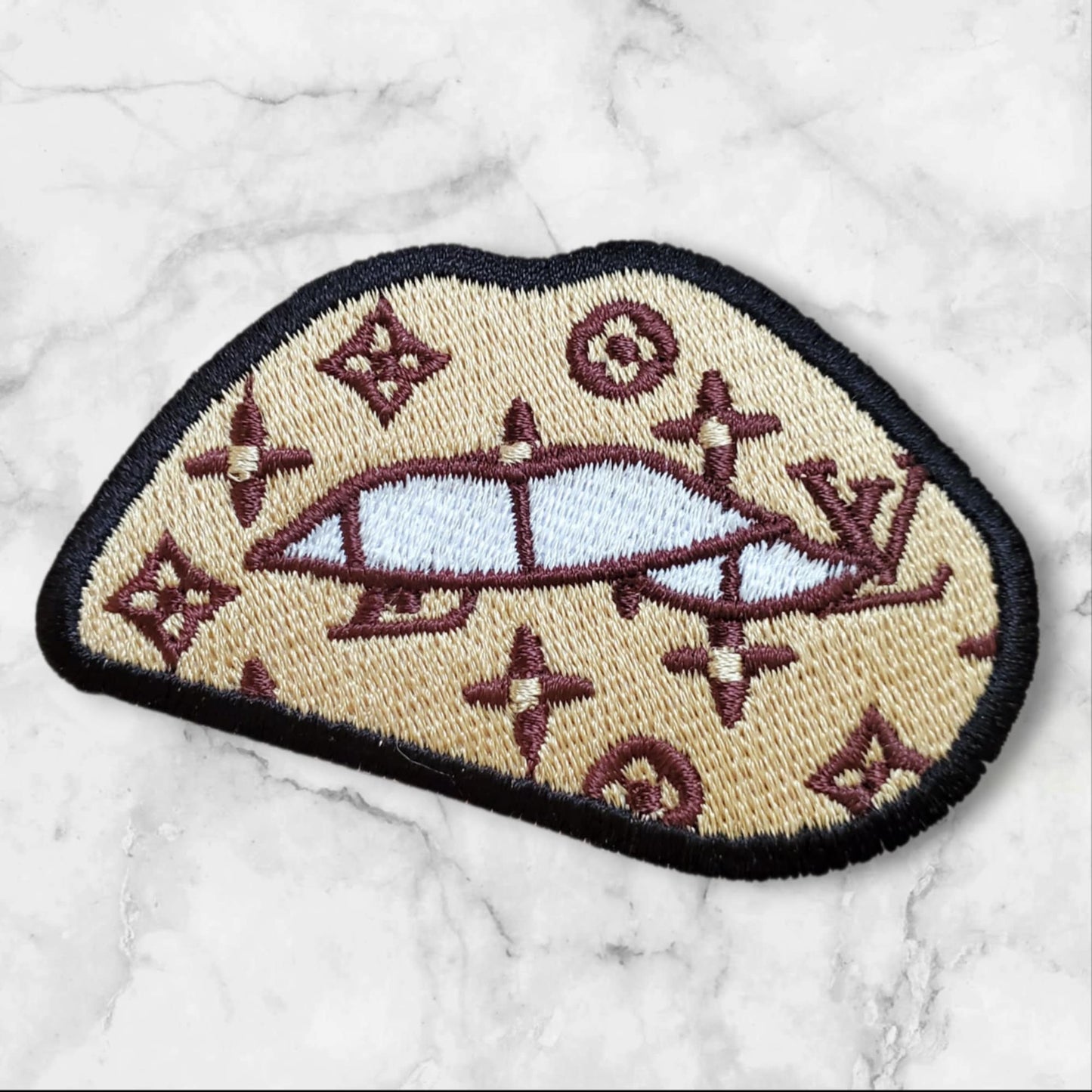 Medium Designer-Inspired Biting Lips Embroidered Patch - Lighter Brown and Cream Monogram Pattern