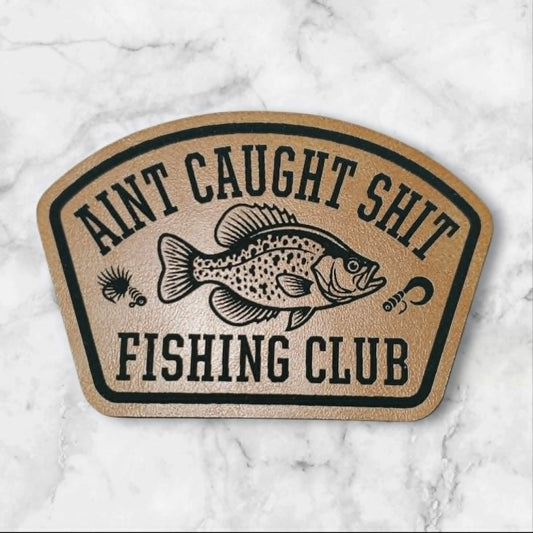 Ain't Caught Sh*t Fishing Club — Leather Hat Patch