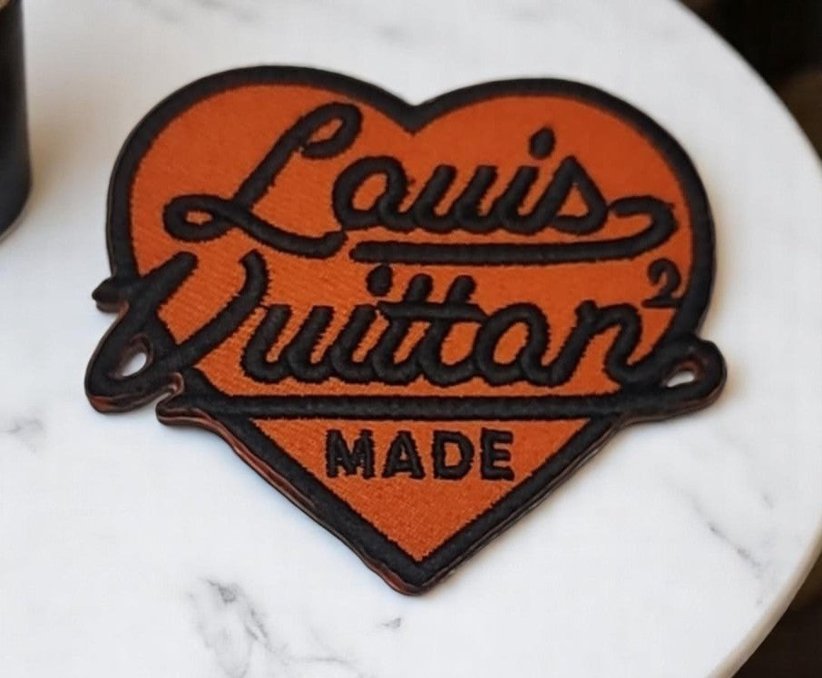 Designer-Inspired Heart Embroidered Patch - Vibrant Orange with Brown Script